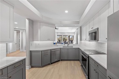 Located in Les Chateaux within the prestigious Pelican Marsh on Pelican Marsh Golf Club in Florida - for sale on GolfHomes.com, golf home, golf lot