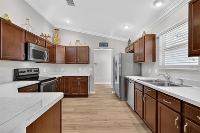 IMMACULATE 3/2 Anchor Cottage Home with GLASS-ENCLOSED LANAI and on Pennbrooke Fairways in Florida - for sale on GolfHomes.com, golf home, golf lot