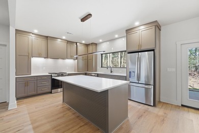 Discover the perfect blend of modern comfort, style, and relaxed on  in Arkansas - for sale on GolfHomes.com, golf home, golf lot