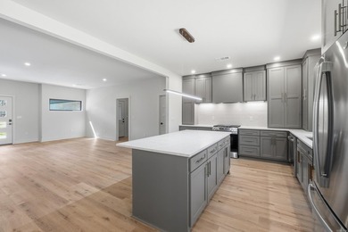 Discover the perfect blend of modern comfort, style, and relaxed on  in Arkansas - for sale on GolfHomes.com, golf home, golf lot