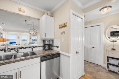 Experience coastal living at its finest in this beautifully on Bethany Bay Golf Club in Delaware - for sale on GolfHomes.com, golf home, golf lot