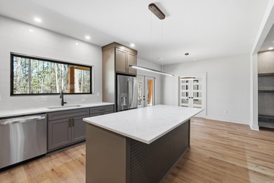 Discover the perfect blend of modern comfort, style, and relaxed on  in Arkansas - for sale on GolfHomes.com, golf home, golf lot