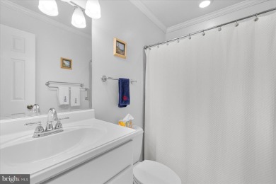 Experience coastal living at its finest in this beautifully on Bethany Bay Golf Club in Delaware - for sale on GolfHomes.com, golf home, golf lot