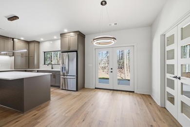 Discover the perfect blend of modern comfort, style, and relaxed on  in Arkansas - for sale on GolfHomes.com, golf home, golf lot