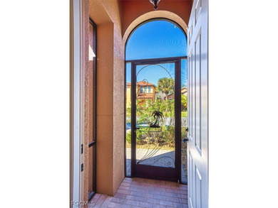 Experience the best of Southwest Florida in this meticulously on Gateway Golf and Country Club in Florida - for sale on GolfHomes.com, golf home, golf lot