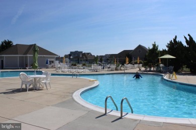 Experience coastal living at its finest in this beautifully on Bethany Bay Golf Club in Delaware - for sale on GolfHomes.com, golf home, golf lot