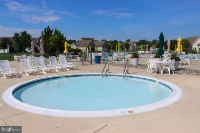 Experience coastal living at its finest in this beautifully on Bethany Bay Golf Club in Delaware - for sale on GolfHomes.com, golf home, golf lot