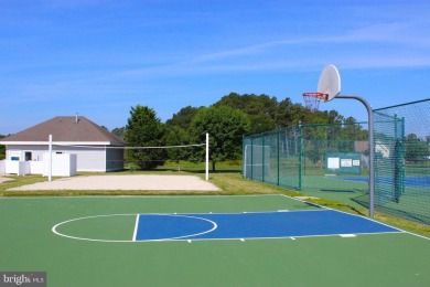 Experience coastal living at its finest in this beautifully on Bethany Bay Golf Club in Delaware - for sale on GolfHomes.com, golf home, golf lot