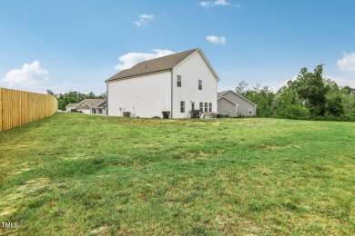 Welcome to your serene retreat nestled in a tranquil country on Reedy Creek Golf Course in North Carolina - for sale on GolfHomes.com, golf home, golf lot