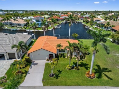 Coveted Burnt Store Isles! Well-maintained 3/2 waterfront home on Twin Isles Country Club in Florida - for sale on GolfHomes.com, golf home, golf lot