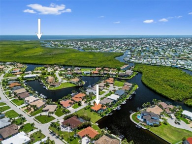 Coveted Burnt Store Isles! Well-maintained 3/2 waterfront home on Twin Isles Country Club in Florida - for sale on GolfHomes.com, golf home, golf lot