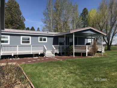 This 1,620' home (built 1987) sits on a golf course adjacent 0.6 on Christmas Valley Golf Course in Oregon - for sale on GolfHomes.com, golf home, golf lot