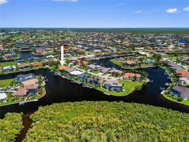 Coveted Burnt Store Isles! Well-maintained 3/2 waterfront home on Twin Isles Country Club in Florida - for sale on GolfHomes.com, golf home, golf lot