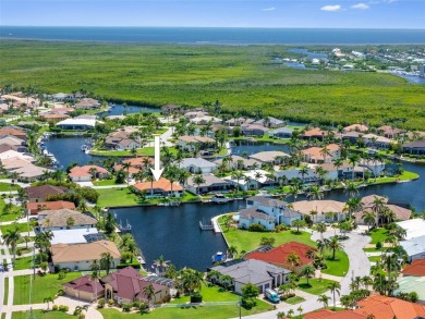 Coveted Burnt Store Isles! Well-maintained 3/2 waterfront home on Twin Isles Country Club in Florida - for sale on GolfHomes.com, golf home, golf lot
