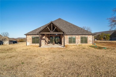 Only a year old, this gorgeous and high quality construction 4 on Wolf Ridge Golf Course in Oklahoma - for sale on GolfHomes.com, golf home, golf lot