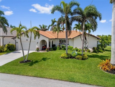 Coveted Burnt Store Isles! Well-maintained 3/2 waterfront home on Twin Isles Country Club in Florida - for sale on GolfHomes.com, golf home, golf lot