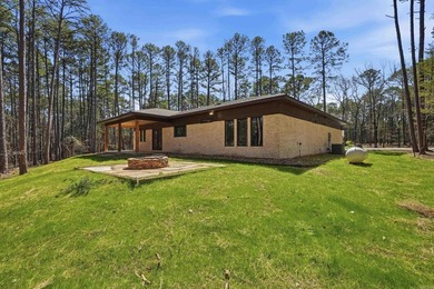 Discover the perfect blend of modern comfort, style, and relaxed on  in Arkansas - for sale on GolfHomes.com, golf home, golf lot
