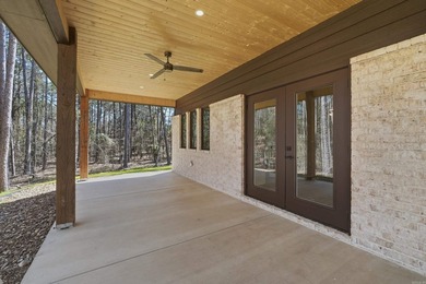 Discover the perfect blend of modern comfort, style, and relaxed on  in Arkansas - for sale on GolfHomes.com, golf home, golf lot