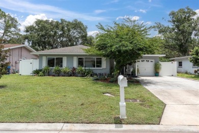 Welcome to your private oasis in the heart of highly on The Dunedin Country Club in Florida - for sale on GolfHomes.com, golf home, golf lot