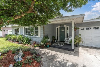 Welcome to your private oasis in the heart of highly on The Dunedin Country Club in Florida - for sale on GolfHomes.com, golf home, golf lot