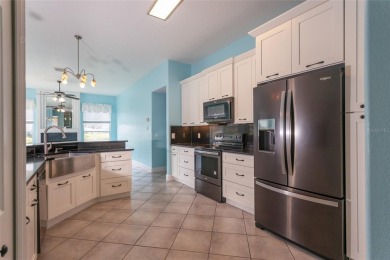 Lakeside Luxury in Palm Coast's Coveted Arlington Community.
 on The Grand Club - Pine Lakes Course in Florida - for sale on GolfHomes.com, golf home, golf lot