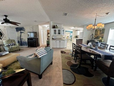 Nestled on a serene cul-de-sac overlooking the 6th Tee and lush on Four Lakes Golf Club in Florida - for sale on GolfHomes.com, golf home, golf lot