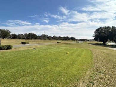 Nestled on a serene cul-de-sac overlooking the 6th Tee and lush on Four Lakes Golf Club in Florida - for sale on GolfHomes.com, golf home, golf lot