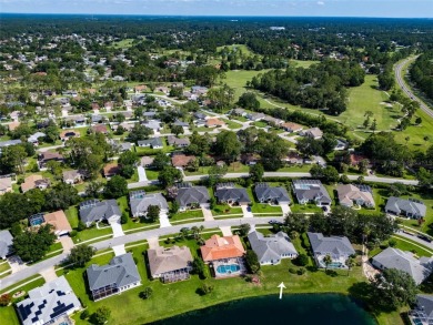 Lakeside Luxury in Palm Coast's Coveted Arlington Community.
 on The Grand Club - Pine Lakes Course in Florida - for sale on GolfHomes.com, golf home, golf lot