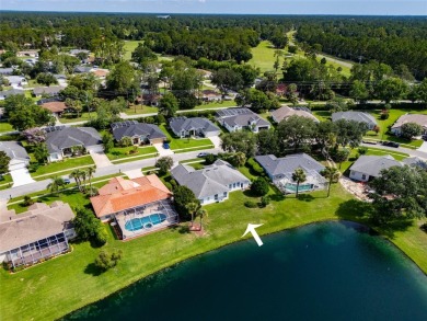 Lakeside Luxury in Palm Coast's Coveted Arlington Community.
 on The Grand Club - Pine Lakes Course in Florida - for sale on GolfHomes.com, golf home, golf lot