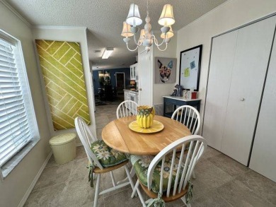 Nestled on a serene cul-de-sac overlooking the 6th Tee and lush on Four Lakes Golf Club in Florida - for sale on GolfHomes.com, golf home, golf lot