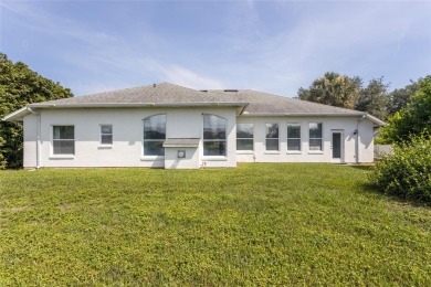 Lakeside Luxury in Palm Coast's Coveted Arlington Community.
 on The Grand Club - Pine Lakes Course in Florida - for sale on GolfHomes.com, golf home, golf lot