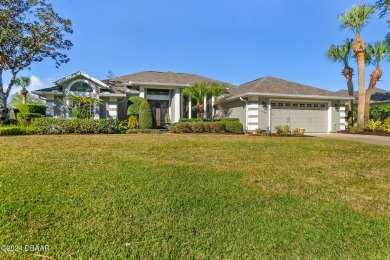IMPECCABLE WATERFRONT POOL HOME!! Welcome to your on Plantation Bay Golf and Country Club in Florida - for sale on GolfHomes.com, golf home, golf lot