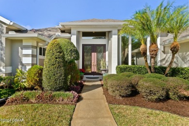 IMPECCABLE WATERFRONT POOL HOME!! Welcome to your on Plantation Bay Golf and Country Club in Florida - for sale on GolfHomes.com, golf home, golf lot