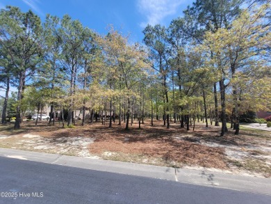 Beautiful naturally treed home site backing up to Leopard's on Ocean Ridge Plantation in North Carolina - for sale on GolfHomes.com, golf home, golf lot
