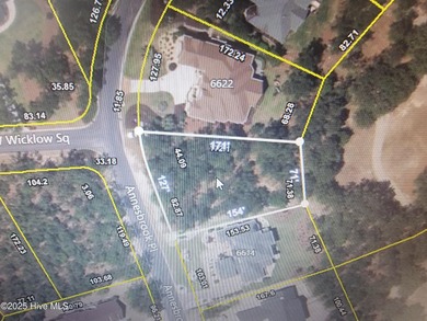 Beautiful naturally treed home site backing up to Leopard's on Ocean Ridge Plantation in North Carolina - for sale on GolfHomes.com, golf home, golf lot