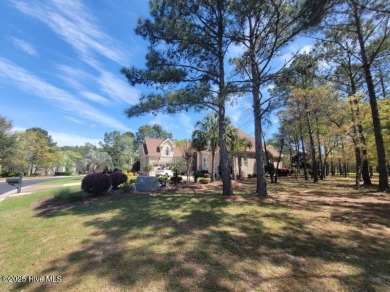 Beautiful naturally treed home site backing up to Leopard's on Ocean Ridge Plantation in North Carolina - for sale on GolfHomes.com, golf home, golf lot