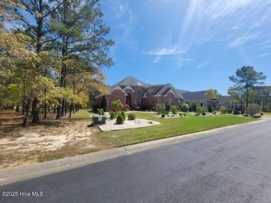 Beautiful naturally treed home site backing up to Leopard's on Ocean Ridge Plantation in North Carolina - for sale on GolfHomes.com, golf home, golf lot