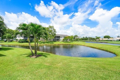 Gorgeous ground-level condo boasting picturesque panoramic lake on Polo Club of Boca Raton in Florida - for sale on GolfHomes.com, golf home, golf lot