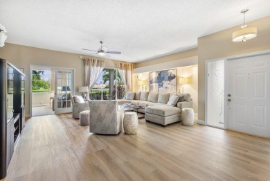 Gorgeous ground-level condo boasting picturesque panoramic lake on Polo Club of Boca Raton in Florida - for sale on GolfHomes.com, golf home, golf lot