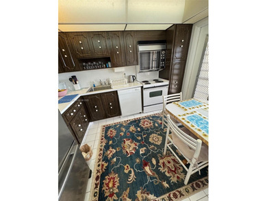 This 2/2 condo in the desirable Palm-Aire community on the 7th on Palm-Aire Country Club and Resort - Palms in Florida - for sale on GolfHomes.com, golf home, golf lot