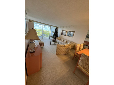 This 2/2 condo in the desirable Palm-Aire community on the 7th on Palm-Aire Country Club and Resort - Palms in Florida - for sale on GolfHomes.com, golf home, golf lot