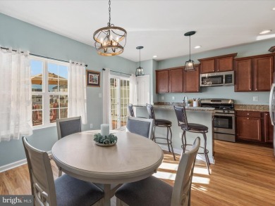 This beautiful three-story townhouse in the highly sought-after on Plantation Lakes Golf and Country Club in Delaware - for sale on GolfHomes.com, golf home, golf lot