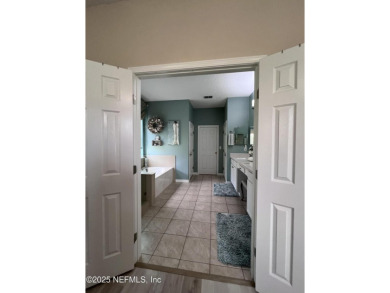 This amazing house features beautiful 21''cathedral ceilings in on Golf Club At Fleming Island in Florida - for sale on GolfHomes.com, golf home, golf lot