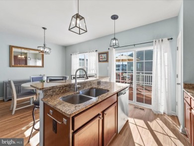 This beautiful three-story townhouse in the highly sought-after on Plantation Lakes Golf and Country Club in Delaware - for sale on GolfHomes.com, golf home, golf lot