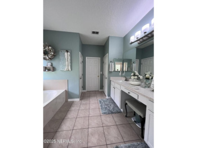 This amazing house features beautiful 21''cathedral ceilings in on Golf Club At Fleming Island in Florida - for sale on GolfHomes.com, golf home, golf lot