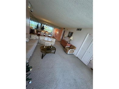 This 2/2 condo in the desirable Palm-Aire community on the 7th on Palm-Aire Country Club and Resort - Palms in Florida - for sale on GolfHomes.com, golf home, golf lot