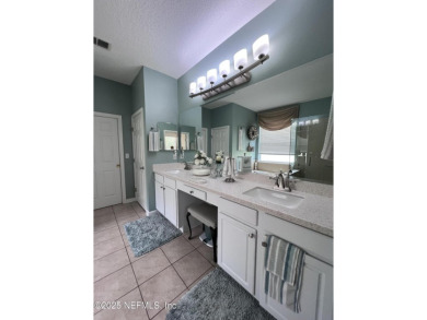 This amazing house features beautiful 21''cathedral ceilings in on Golf Club At Fleming Island in Florida - for sale on GolfHomes.com, golf home, golf lot