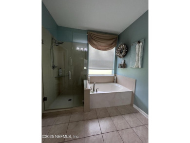 This amazing house features beautiful 21''cathedral ceilings in on Golf Club At Fleming Island in Florida - for sale on GolfHomes.com, golf home, golf lot