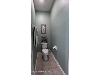 This amazing house features beautiful 21''cathedral ceilings in on Golf Club At Fleming Island in Florida - for sale on GolfHomes.com, golf home, golf lot