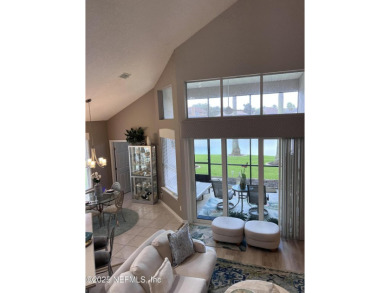This amazing house features beautiful 21''cathedral ceilings in on Golf Club At Fleming Island in Florida - for sale on GolfHomes.com, golf home, golf lot